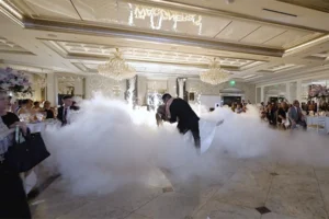 Venetian Caterers NJ, bride and groom dancing in the clouds