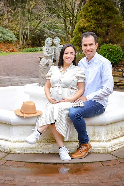 MC Productions NJ – Scenic maternity portrait captured in a NJ park with soft, romantic tones